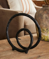 INFINITE LOOP SCULPTURE IN AGED BLACK